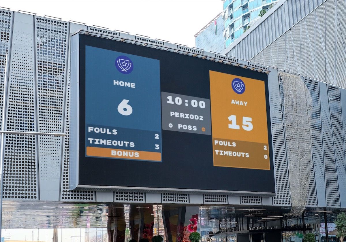 An outdoor hockey scoreboard. The scoreboard is being controlled by a web-browser